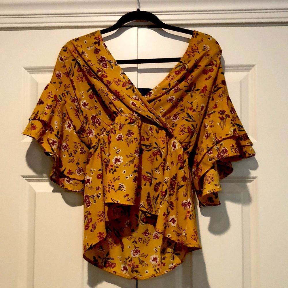 This is a golden yellow top from blue rain